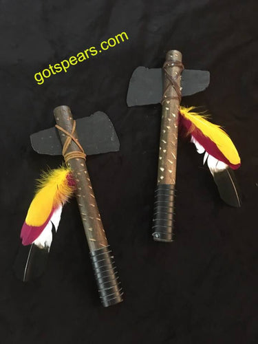set of hatchets facing each other